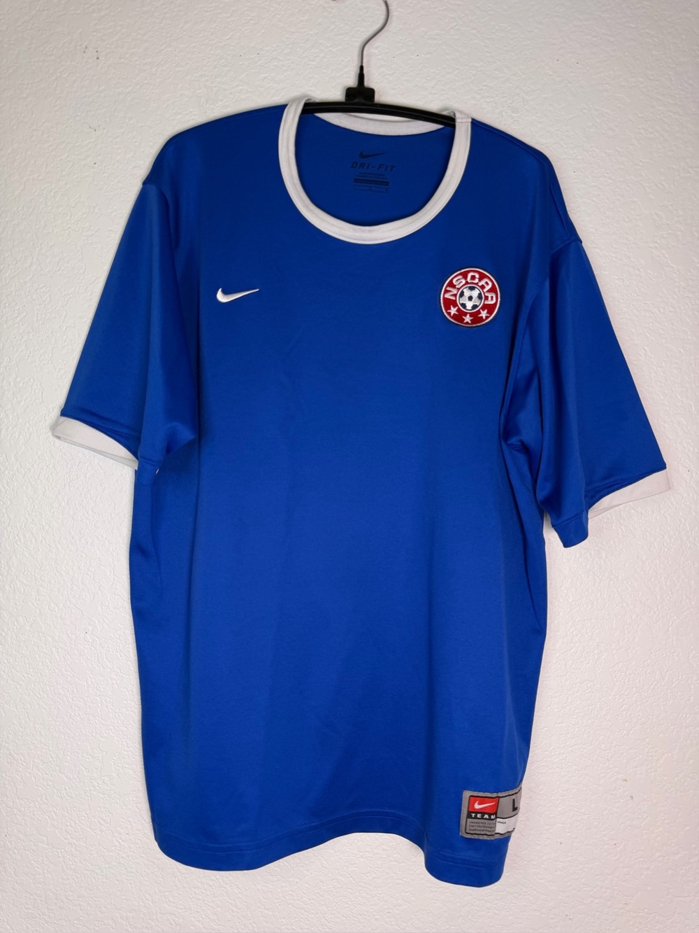 Nike Blue Dri-FIT Performance Tee with White‎ Collar and Soccer Logo, Size L